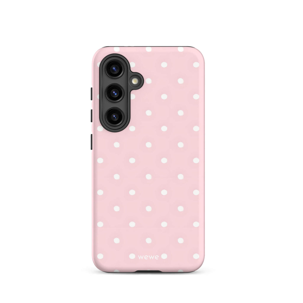 Custom samsung galaxy s24 Phone case with a soft pink background and a pattern of small white polka dots.