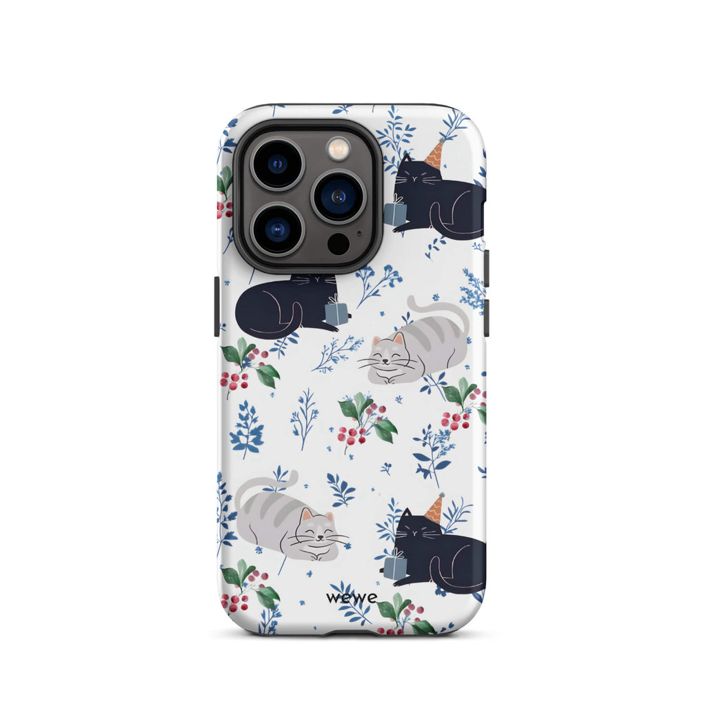 Custom iPhone case 14 pro with a cute pattern of black and gray cats wearing party hats, cherries, and floral sprigs on a white background.