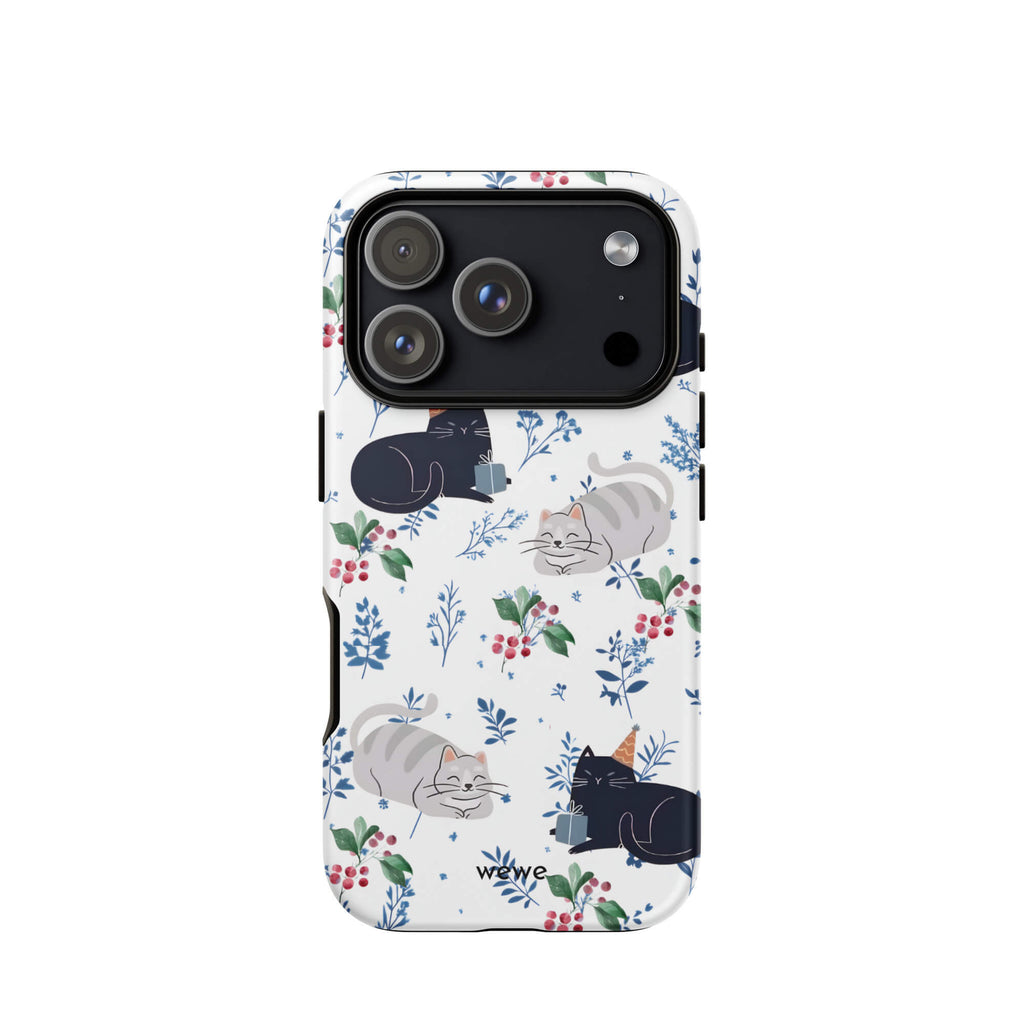 Custom iPhone case 17 pro with a cute pattern of black and gray cats wearing party hats, cherries, and floral sprigs on a white background.