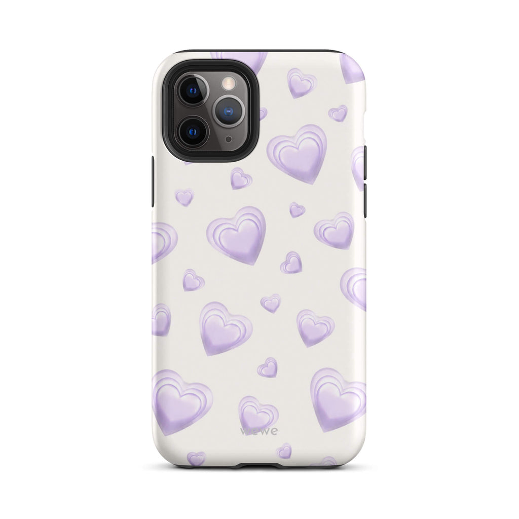Purple Heart Phone Case featuring scattered layered lavender and lilac 3D hearts in mixed sizes on a creamy white background