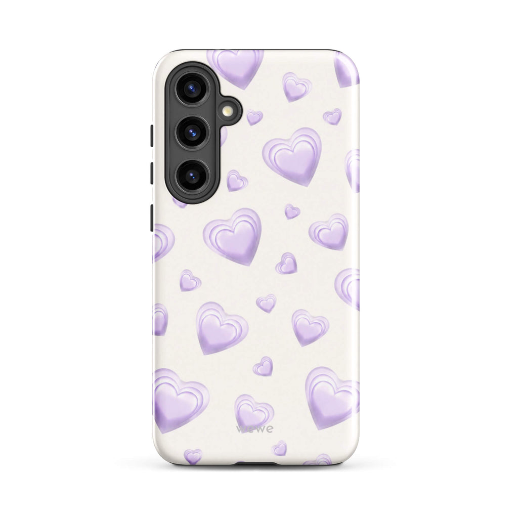 Purple Heart Phone Case featuring scattered layered lavender and lilac 3D hearts in mixed sizes on a creamy white background