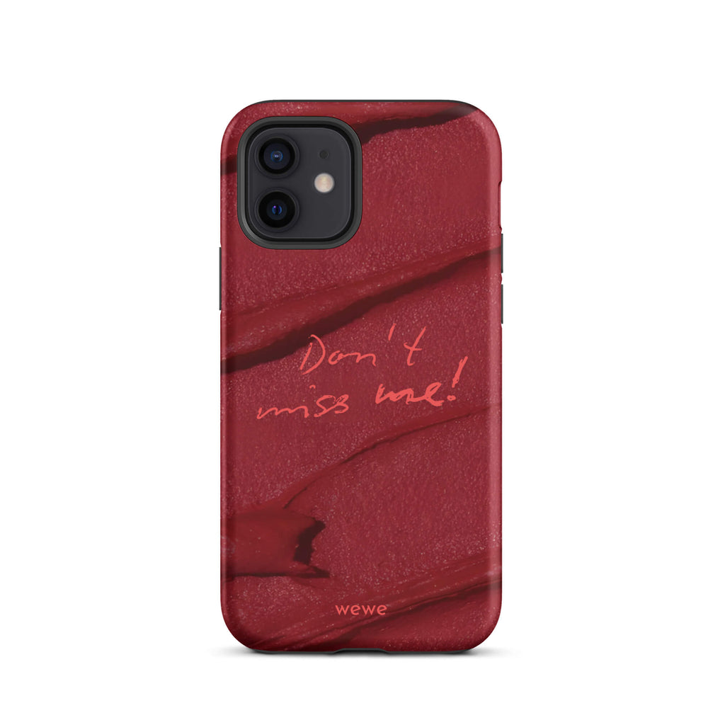 Custom iPhone case 12 with a deep red, textured lipstick smudge design and the handwritten text "Don't miss me!".