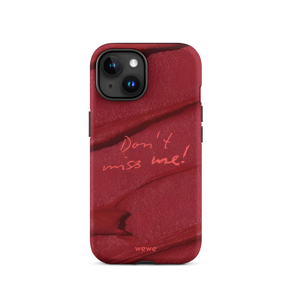 Custom iPhone case 15 with a deep red, textured lipstick smudge design and the handwritten text "Don't miss me!".