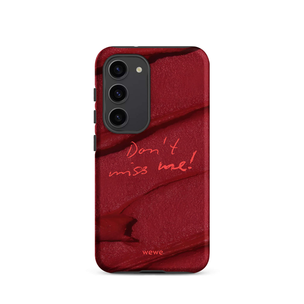 Custom samsung galaxy s23  Phone case with a deep red, textured lipstick smudge design and the handwritten text "Don't miss me!".