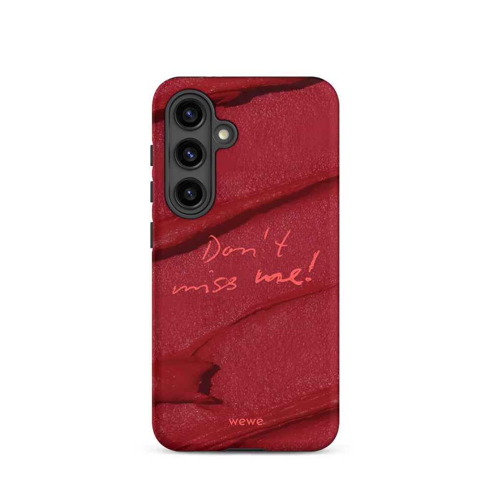 Custom samsung galaxy s24  Phone case with a deep red, textured lipstick smudge design and the handwritten text "Don't miss me!".