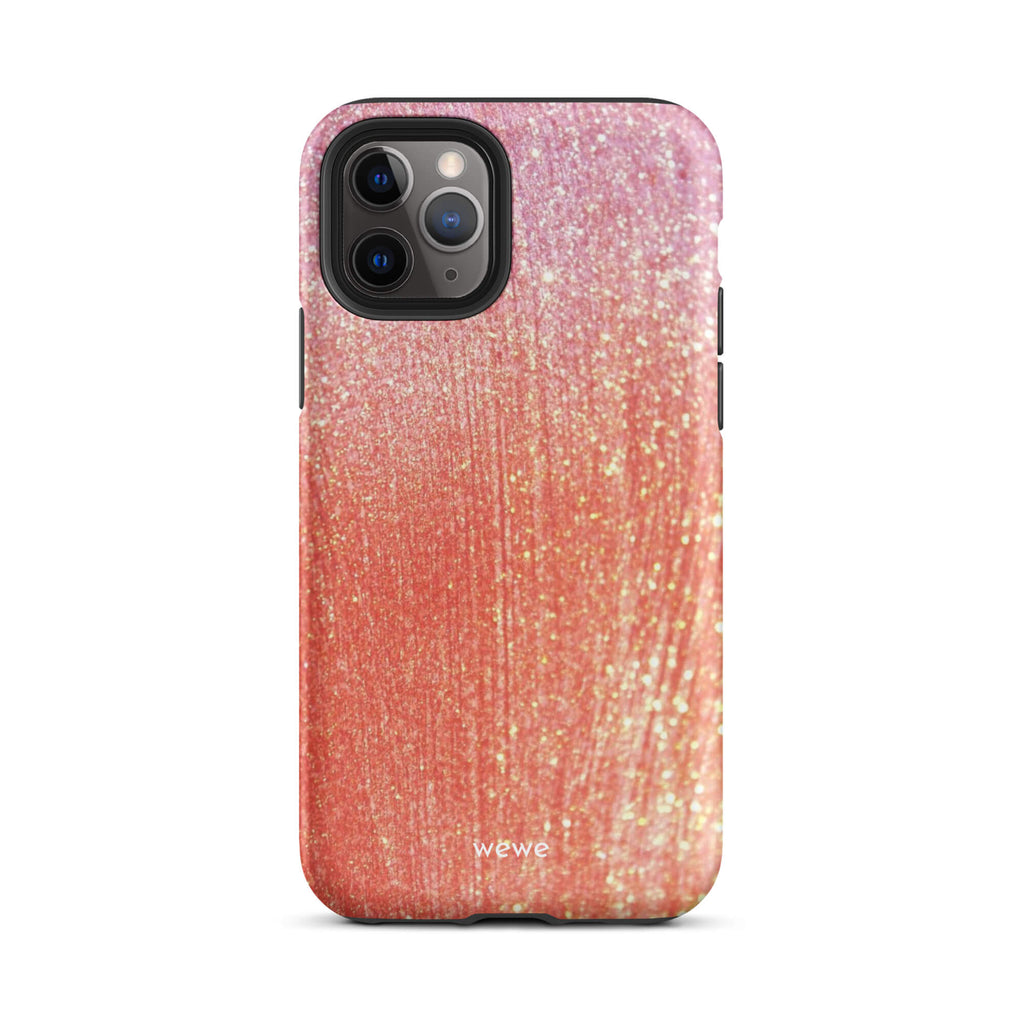 Custom iPhone case 11 pro with a sparkling rose gold glitter ombre design, fading from darker pink to lighter gold.