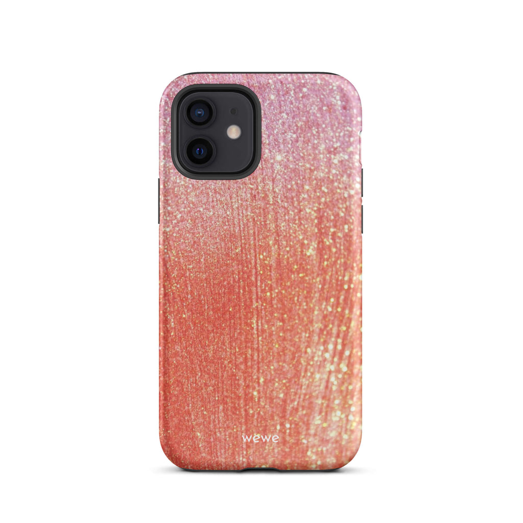 Custom iPhone case 12 with a sparkling rose gold glitter ombre design, fading from darker pink to lighter gold.