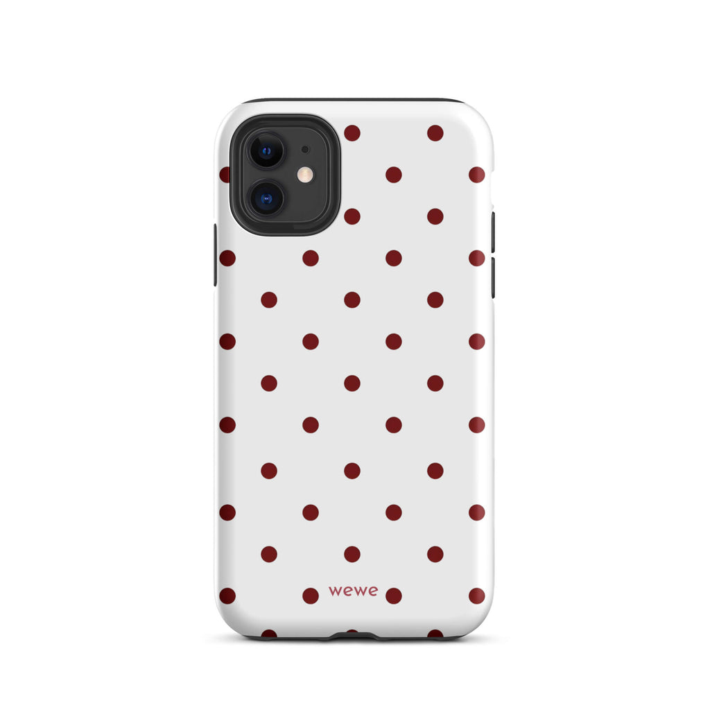 Custom iPhone case 11 with a  clean white background and a classic pattern of small, maroon red polka dots.