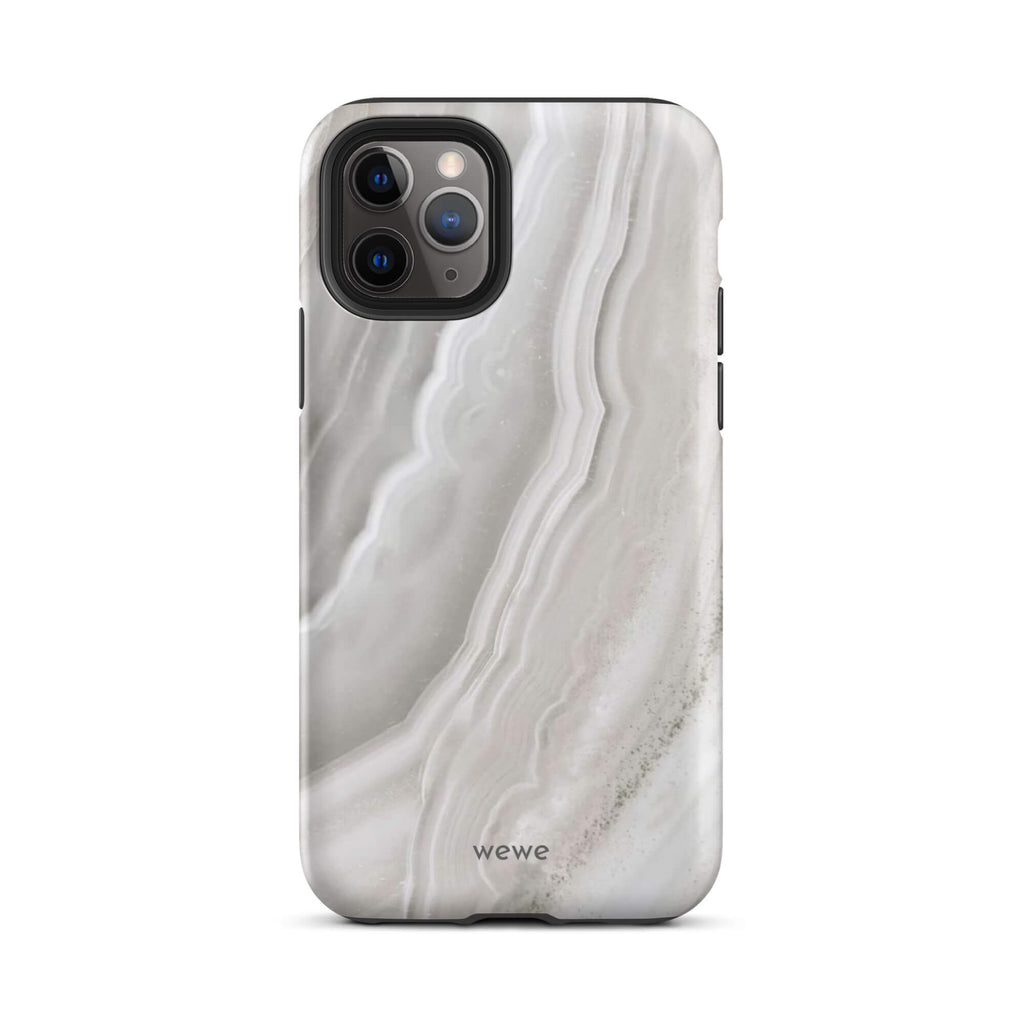 Custom iPhone case 11 pro with a  close-up image of a white and grey agate slice with swirling patterns.