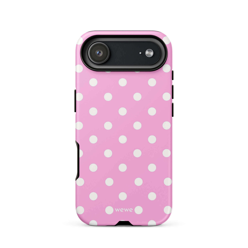 Candy-pink iPhone case with evenly spaced soft-white polka dots