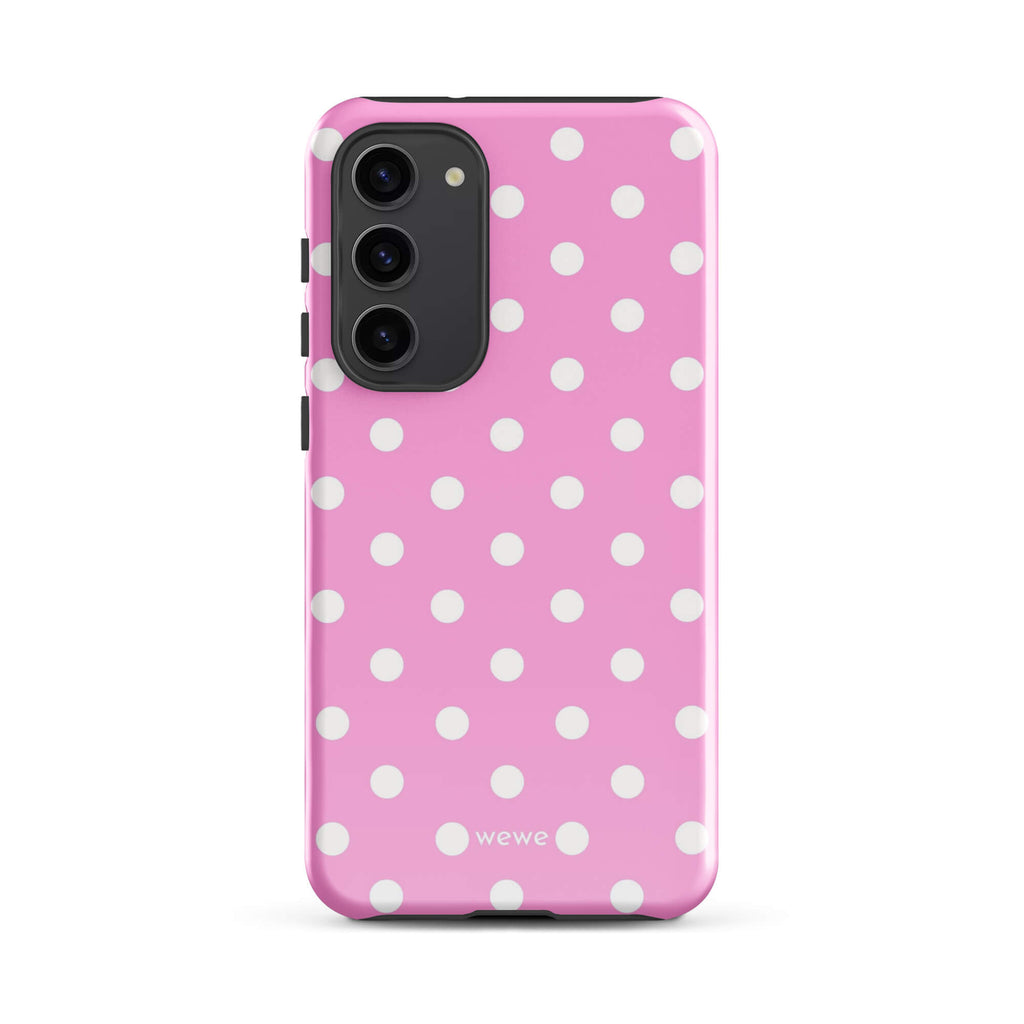 Candy-pink iPhone case with evenly spaced soft-white polka dots